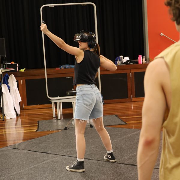 Two actors in rehearsals for the high school show 'The Flipside'