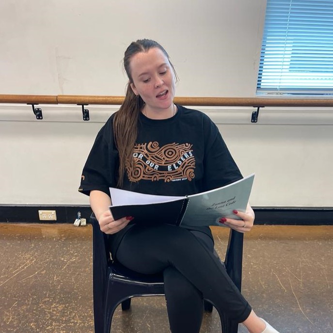 Ana actor in rehearsals reading lines form a script